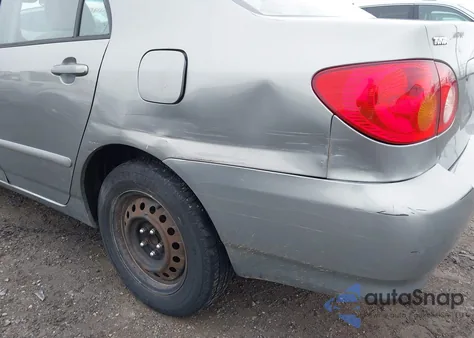 2003 Toyota Corolla Le z USA, uszkodzony, nr VIN 2T1BR32EX3C087960